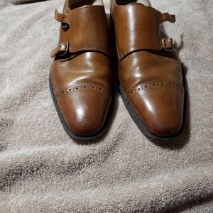 Men's 9.5 brown leather shoes.